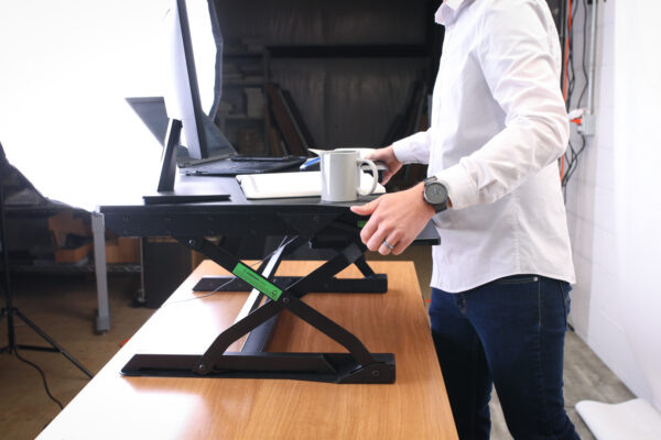 a standing desk converter doesn't adjust in rhythm with you